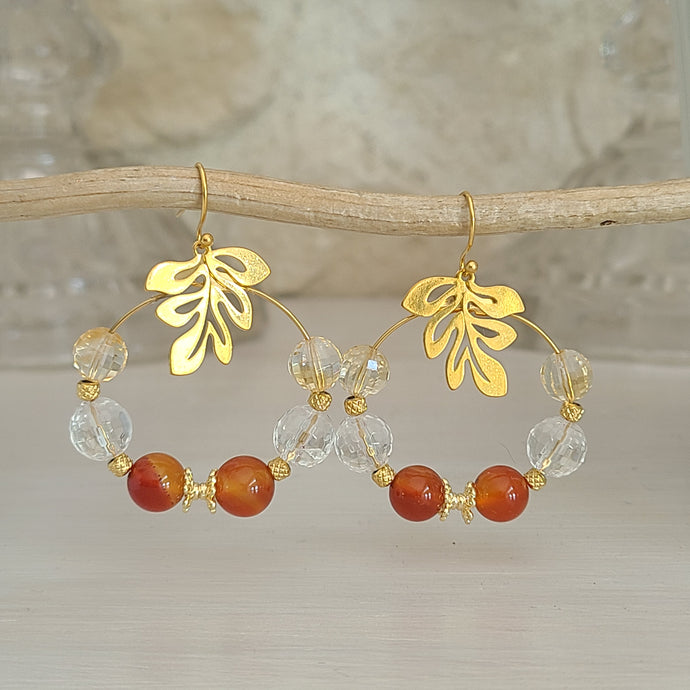 Boucles d'oreilles créoles en acier cornaline et citrine.