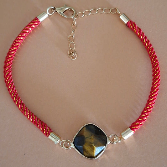 Bracelet cordon nylon avec oeil de tigre facetté 