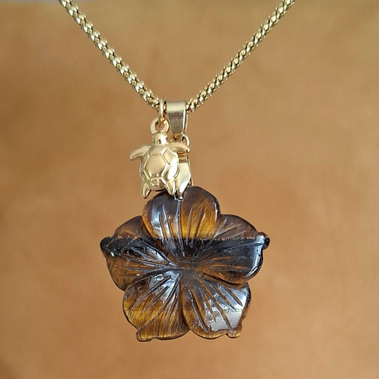 Collier en acier et oeil de tigre en forme de fleur avec breloque tortue