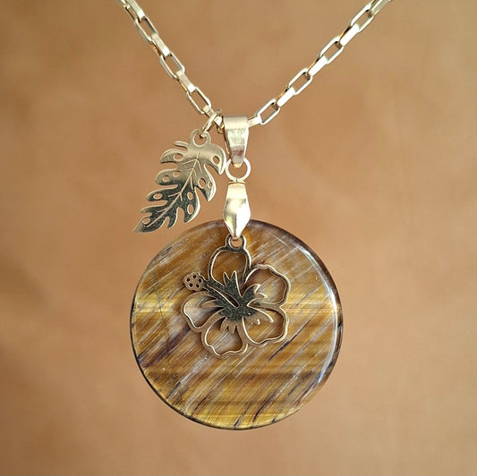 Collier acier doré et oeil de tigre rond avec breloques fleur et feuille