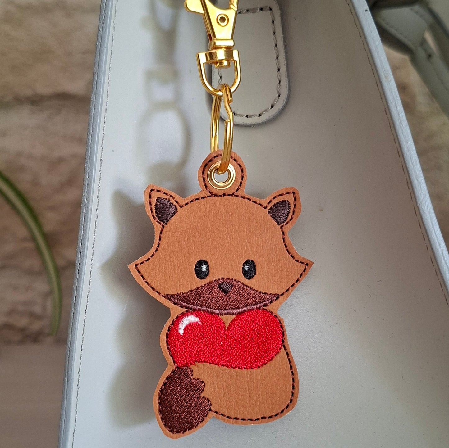 Porte-clés renard utilisé comme bijou de sac ou grigri de sac