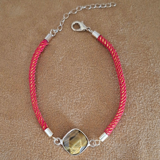 Bracelet cordon rouge et doré avec œil-de-tigre naturel facetté
