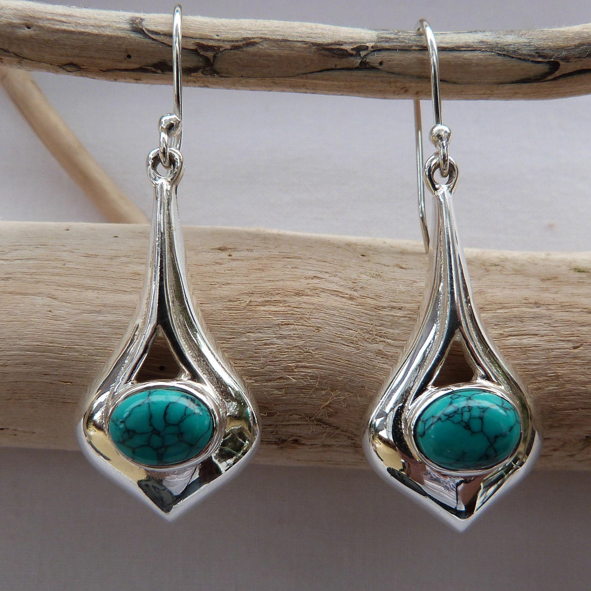 Boucles d'oreilles longues forme goutte en argent et turquoise 