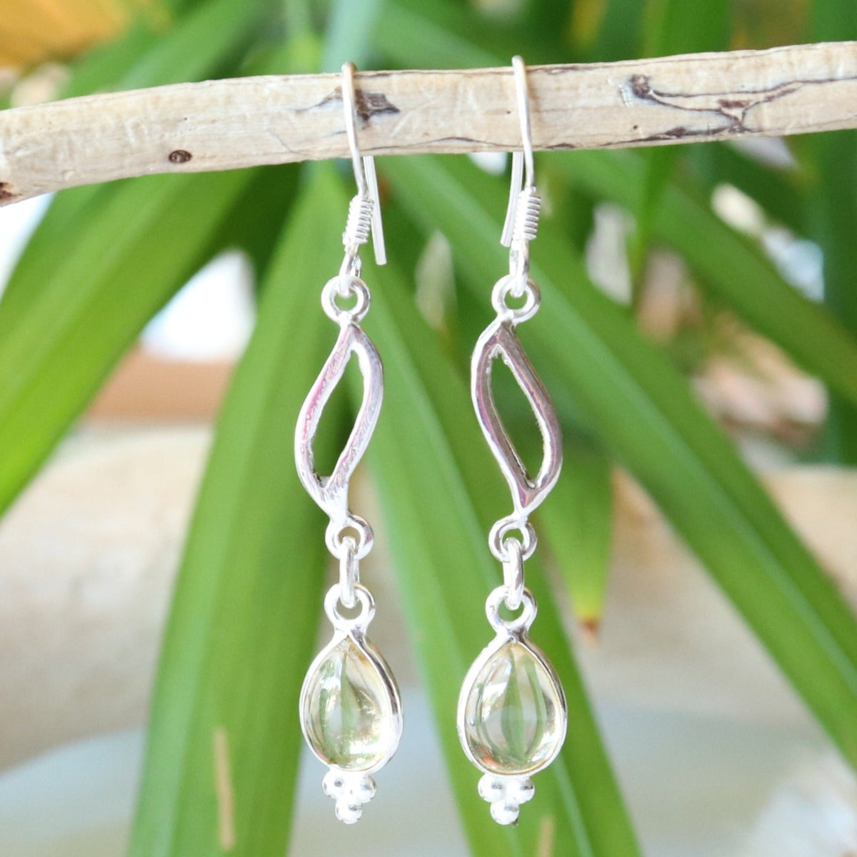 Boucles d'oreilles longues fantaisie en argent et citrine 