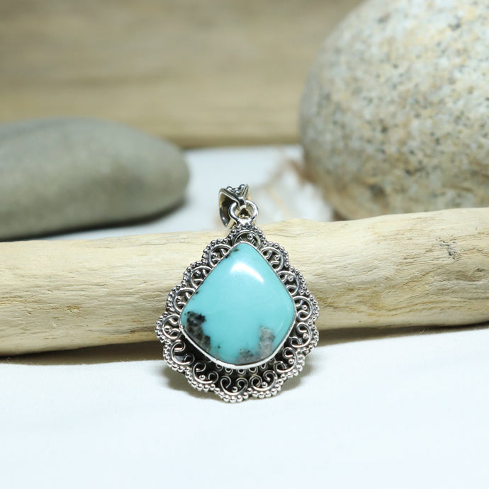 Pendentif en argent et turquoise du Mexique