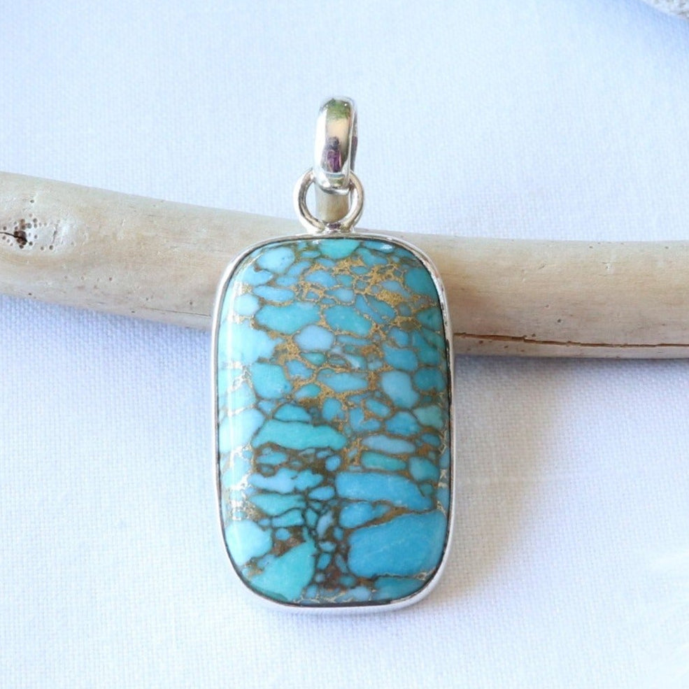 Pendentif rectangulaire en argent et turquoise à inclusion de cuivre