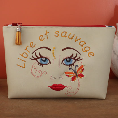 trousse femme brodée visage féminin libre et sauvage écru